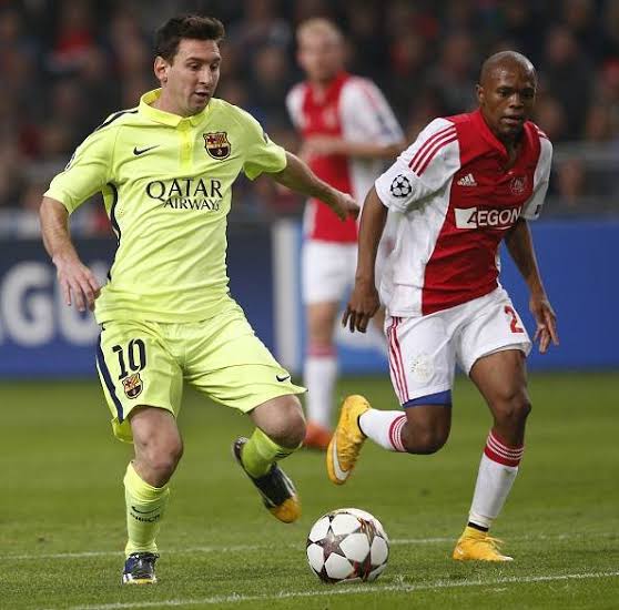 Thulani Serero and Leo Messi